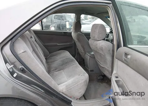 2002 Toyota Camry Le from USA, damaged, VIN JTDBE32K520097841